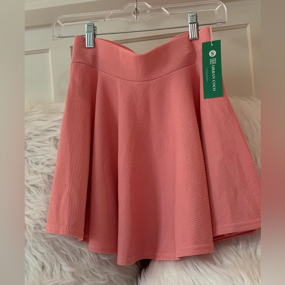 New, never worn pink urban coco skirt. Tags still attached.